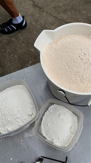 Here John is adding the final 12 1/2 pounds of KAOLIN to the batch. The slip is pretty thick by now so the kaolin doesn’t go in easily and it takes a bit of time to make sure everything is mixed up pretty well. At the end, all the clay and materials are in the batch of porcelain. All that needs to be done is for the slip to be screened, and Epsom salts added. Epsom salts will tend to thicken the batch of Porcelain so we don’t want to add it until after the sieving. . . . To be notified of future