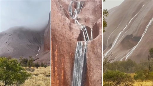 Waterfalls pouring down the sides of Uluru