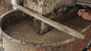 Lokta bark being mixed in water inside machine in lokta paper factory, Kathmandu, Bagmati Province, Nepal Stock Video
