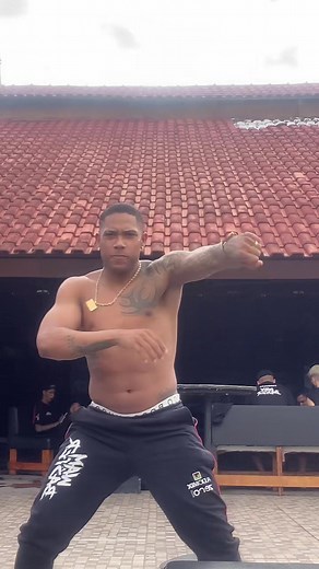 Outdoor Dance Performance by a Muscular Dancer