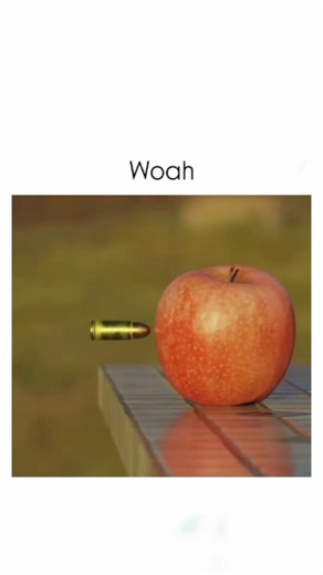 Zynox on Instagram: "The post features a slow-motion video of a bullet dramatically exploding an apple, captioned simply "Woah.", amassing 3.6 million views and 1,900+ replies within hours of posting on December 3, 2025. - Community feedback reveals it's AI-generated, as the bullet flies with its brass casing intact—a physical impossibility, since casings eject from firearms before the projectile exits the barrel. - Real bullet-apple impacts, captured in high-speed footage like 49,000 fps videos