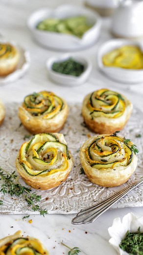 Cheesy Zucchini Roses 🌹 Inspired by those pretty zucchini flowers on Instagram, I’ve made Zucchini and Goat Cheese Puff Pastry Rolls shaped like roses. Each slice of tender zucchini hugs creamy goat cheese and fragrant thyme, all wrapped in flaky pastry. With every bite, it feels like I’m strolling through sunny fields and cozy cafes in Provence. Ingredients * 1 package puff pastry, thawed * 2-3 zucchini (green and yellow) * 1 package goat cheese * Dried thyme leaves * Olive oil * Salt and pepp