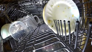 Inside view on washing of ware in the dishwasher