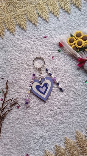 Bloom & Brush Creations on Instagram: "DIY Aesthetic Keychain 💜। . . [Keychain tutorial, aesthetic craft, diy gift, purple keychain, easy diy for beginners, beads craft, keychain,easy craft, diy craft] . . #keychains #reelitfeelit #trendingnow #viralreels #aesthetic #beadswork #acrylicpainting #purplelover #easydiy"