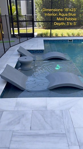 Beautiful swimming pool and spa with large sunshelf, glass tile raised spa with therapy jets, water features, travertine deck and screen enclosure in Central Florida #Backyardgoals #pooldesign #orlandopools | Artesian Pools