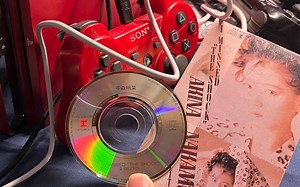 索尼黑科技！吸入式光驱PS3能放3寸小CD