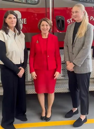 In St. Louis Park with Julie Paidar, her daughter Meagan, and local firefighters to highlight my bipartisan Honoring Our Fallen Heroes Act becoming law. After firefighter Mike Paidar died of leukemia, we worked together to support families facing service-related cancers. | Amy Klobuchar