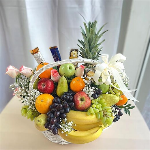 Bloom   Bite Deluxe Basket  Pink Roses, Fresh Fruit Medley, Godiva Ferrero Chocolates | Healthy‑Luxury Gift Dubai, Edible Bouquets Dubai Emirate, Dubai, United Arab Emirates, buy at a price of 230.67 AED, Fruit Bouquets on GARDEN OF EDEN FLOWERS with delivery | Udora