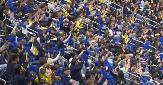 Michigan fans cheer on the Wolverines across Metro Detroit