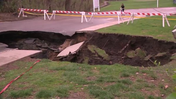 Large Urbandale sinkhole causes road blockage outside apartment complex