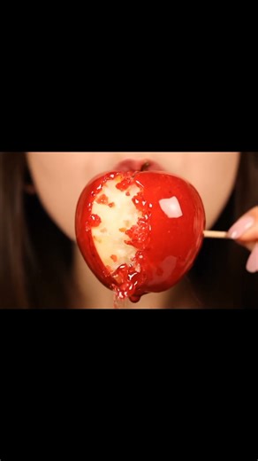 Crunchy sounds, bright red glaze! 🍎✨ Apple candy ASMR that tingles your senses! #asmr #candyeating #