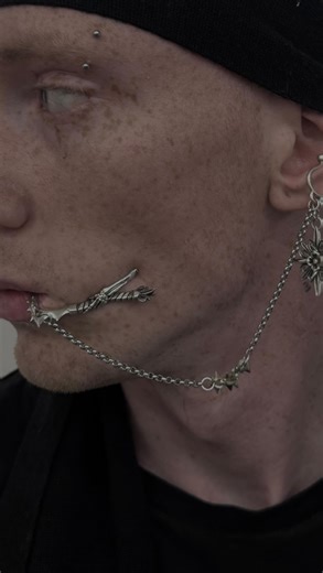Comte Dracula on Instagram: "COMTE CHEEK PIN 🦇🖤 this piece hella experimental... but what yall think? would you rock this? 🤔"