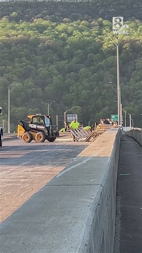Crews clean up after truck flips over, spilling pallets across Clarks Ferry Bridge