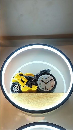 Motorcycle headlight out of a circular LED wall sconce?