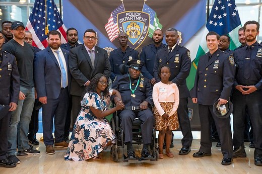 Detective Dalsh Veve's wife Esther speaks after Veve received the Medal of Honor