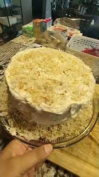 pineapple coconut cake with a pineapple filling and a coconut cream cheese frosting 😋🍰
