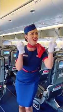 Beautiful girl closing Plane door. Stewardess working. Flight Attendant. Hot Airhostess. Aviation.