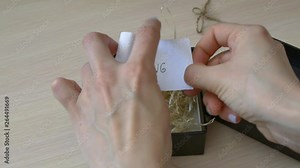 motivational message "keep moving" in a note in a gift box Stock Video