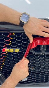 Audi RS5 Emblem Edge Wrap – Unique Red Satin Accent🚗 In this video, we show a unique and creative way to customize the front emblem on an Audi RS5. Instead of wrapping the four rings themselves, we focus on the thin edge area around the emblem — the space between the rings and the grille. ❤️✨We use a bold satin red vinyl to add a striking accent that makes the badge stand out and gives the car a more aggressive, sporty style.You’ll see the full process step by step:✅ Cutting and applying the vi