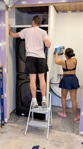 installing built ins for storage laundry room makeover #homemakeover #renovation #woodworking