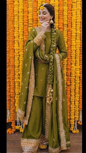 Hina Haram on Instagram: "Beautifully adorned with a floral-accented braid and traditional attire for the Haldi/Mayun function.🤍 Now you can customise your article with shalwar, sharara or sharara pants . Inbox for details or queries. #hinaharamofficial"