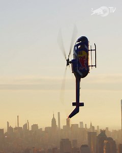 Flippin' out for the best view of the city. 🚁🔄 | Red Bull
