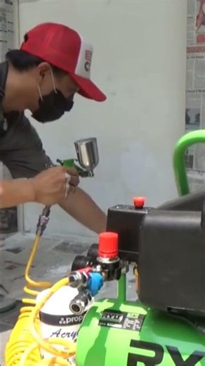 Ryu 0.75 hp electric compressor machine for spraying paint on wooden doors with tekiro spray gun