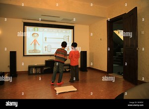 Two boys playing games Stock Photo - Alamy