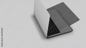 A 3d animated laptop computer with bluish code on the screen opens and a “Future” key is pressed