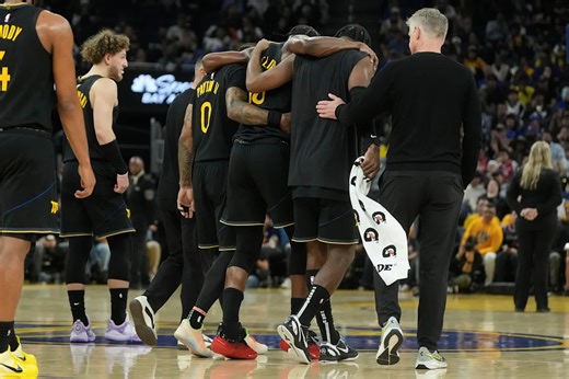 Warriors star Jimmy Butler goes down with right knee injury in win over Heat