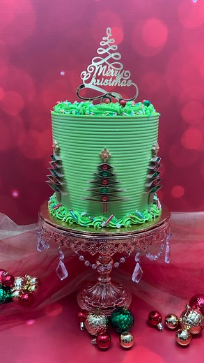 Still one of my favorites Christmas 🎄 cake decorating tutorial 😍😍😍 I made the Christmas trees 🎄 from edible chocolate balls and wafer paper Smooth hound and Micro scallop cake comb from Estercakes.com Cake stand from @opulenttreasures Use code : Ester20 for discount Christmas sprinkles from @manvscakes | Sweet Escape