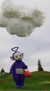 If only we could change our outfits this easily 🪄💜💚 Video: Tinky Winky, the purple Teletubby, is getting rained on. Dipsy, the green Teletubby turns the page of the magic book and an umbrella appears next to Tinky Winky. | Teletubbies