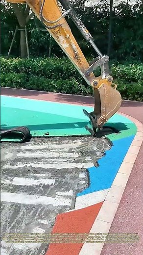 Peeling Rubber: How An Excavator Removes Old Playground Safety Surfacing