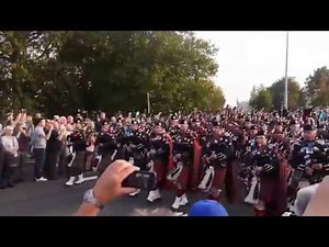Mass pipes & drums marching on John Frost bridge, Arnhem - 19th Sept, 2014