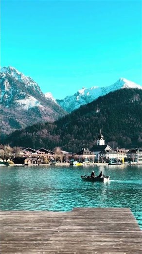 Scenic Alpine Lake with Snowy Mountain Backdrop