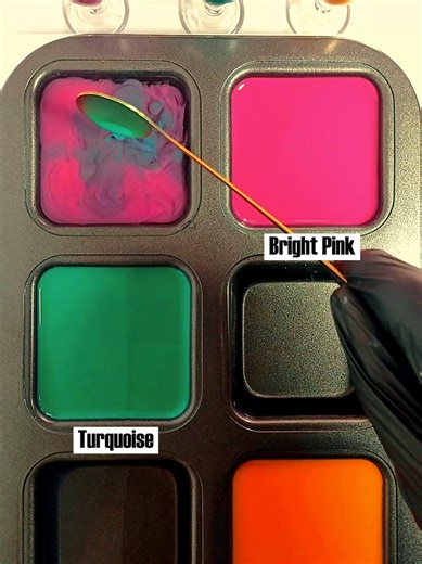 Vibrant Color Mixing: Bright Pink, Turquoise, and Golden Yellow