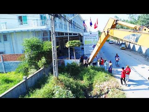 Oh! Wonderful action Excavator cat is digging& removing garbage from the canal