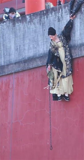 Life's Debt Meets Bond: A Hand's Embrace Across Eras