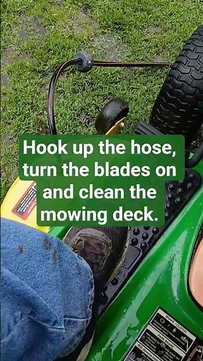 How to clean the mowing deck on a John Deere riding.mower.
