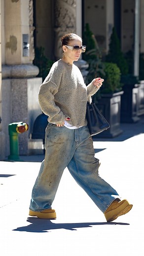 431 reactions · 297 comments | #Jlo sports dirty jeans to run errands in NYC. The singer paired the pants, made to look muddy on purpose, with a boxy sweater and platform boots. But would you dare wear them? | Hollywood Pipeline | Facebook