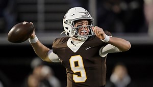 Mount Carmel QB Jack Elliott changes direction after call from Vanderbilt
