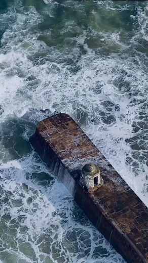 Some slow motion waves hitting the monkey hut at Portreath 🌊 #Cornwall #cornishdronephotography #waves #Portreath | Cornish drone photography