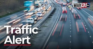 Decatur Police respond to overturned semi-truck on Hudson Memorial Bridge in Decatur