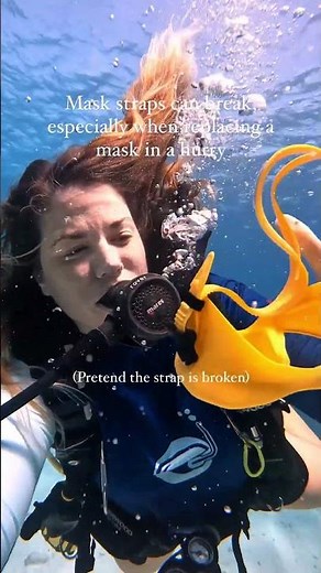 Female scuba diver demonstrating how to take and put back on scuba mask underwater