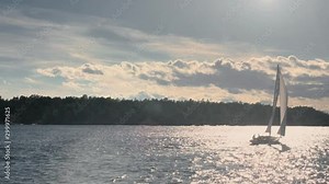 Sun Flare on Modern Sloop Exploring Stockholm Archipelago at Sunset