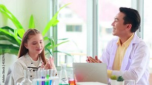 science experiment. African american and diversity teenage students caring out experiments in chemistry class