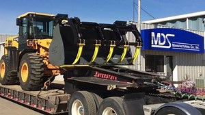 Check out this short 30 second commercial on the MDS Intimidator bucket and grapple for wheel loaders. After four years on the market it’s still unmatched by anything else available. Heavy-duty construction. We have also added the JCB Q-fit capability to this bucket. Starting at 1.5 yard and going all the way to 4.6 yard. | MDS Manufacturing Co. Inc.