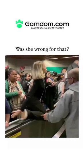 Flash Frame 🖼️ on Instagram: "The video captures a crowded, stationary escalator in a public transit area where a woman in black climbs aggressively over others to bypass a jam caused by bystanders assisting a man in a wheelchair up the steps, prompting debate on urgency versus courtesy. Replies largely defend the woman, arguing the wheelchair user's presence created a safety risk and blockage on the non-moving escalator, with many suggesting elevators as a better alternative to avoid hazards. 