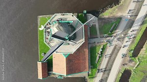 Zaanse Schans rural windmills, fields and river landscape, North Holland, Netherlands, aerial view