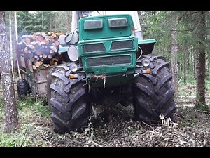 Logging with XTZ T-150K forwarder, wet forest conditions